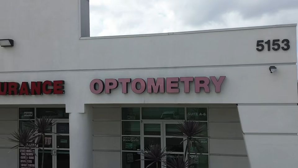The storefront at 5153 Holt Blvd in Montclair, with its Optometry sign.